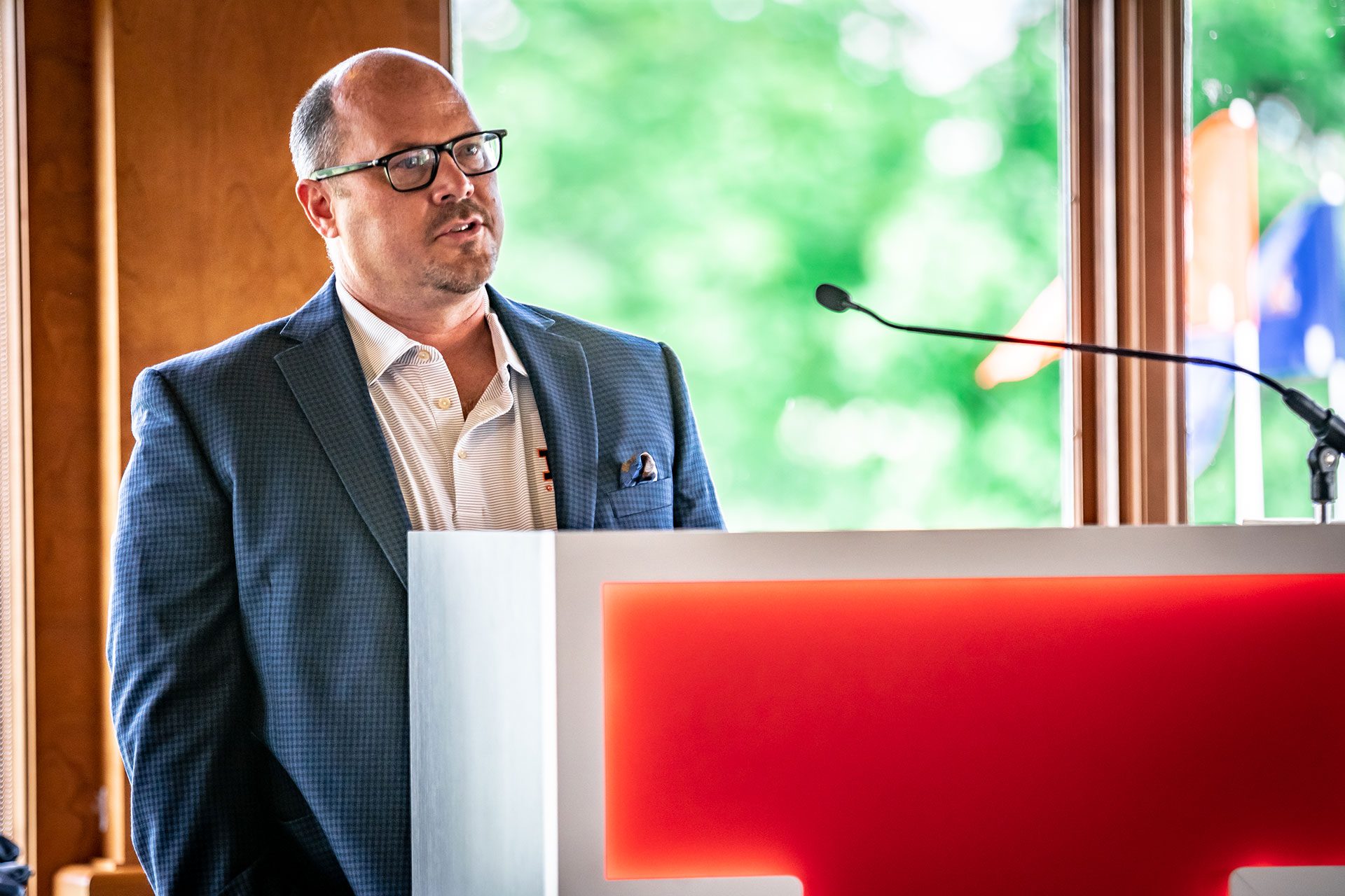 Spencer Atkins speaking at a Press Conference announcing the gifting of Atkins Golf Club to the U of I in 2020.